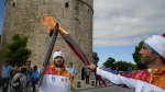 Сегодня состоится передача олимпийского огня  организаторам Игр-2014 в Сочи