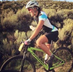 Jen Hudak sits on bike for Sarah Burk Foundation 